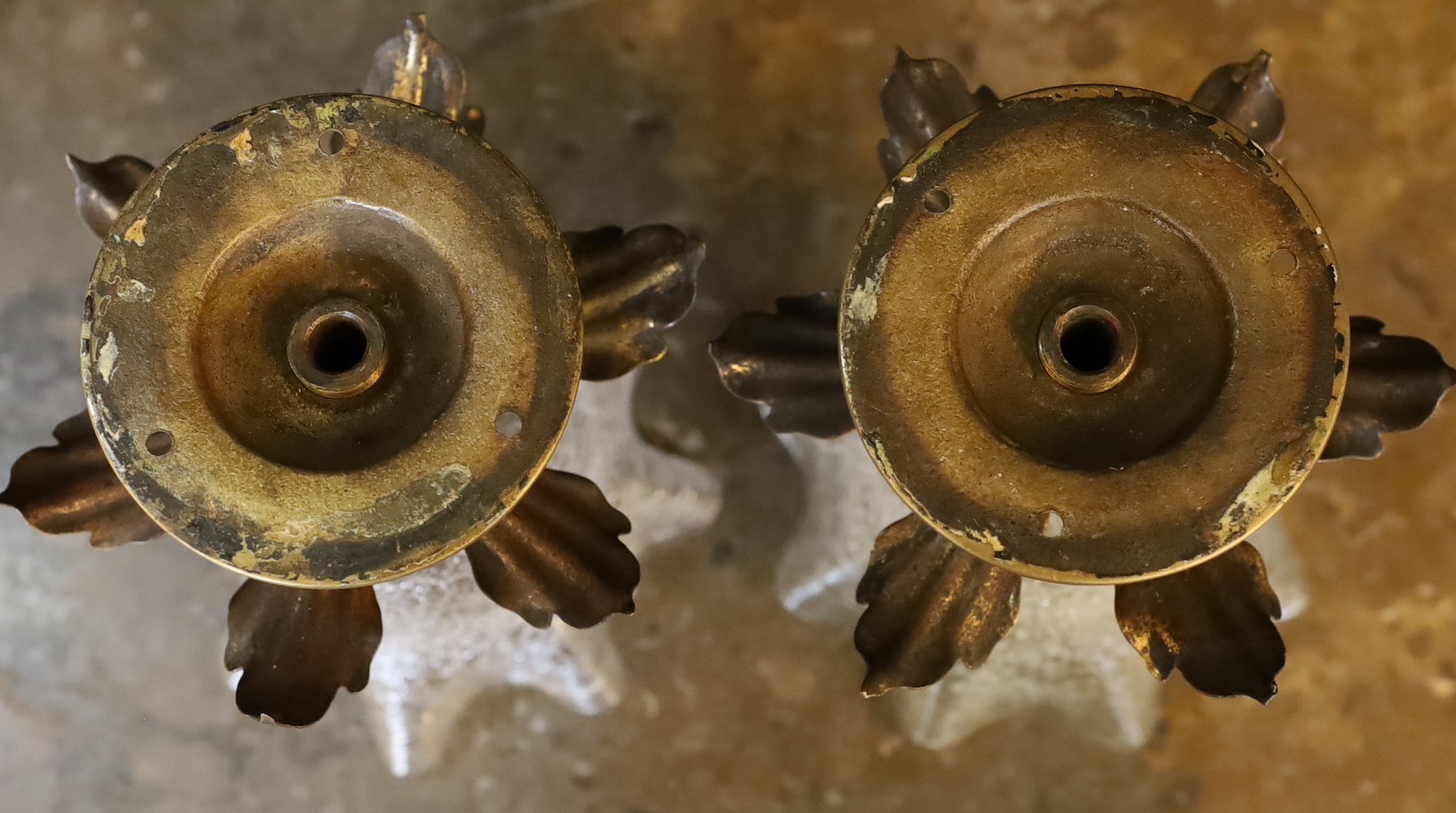 A pair of 1930s English brass ceiling lights of foliate form with crackle glass shades, height 19cm